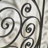 Arched wrought iron gate