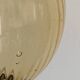 Table lamp with an antique gold glass lampshade