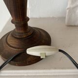 Turned wooden lamp, tartan lampshade.