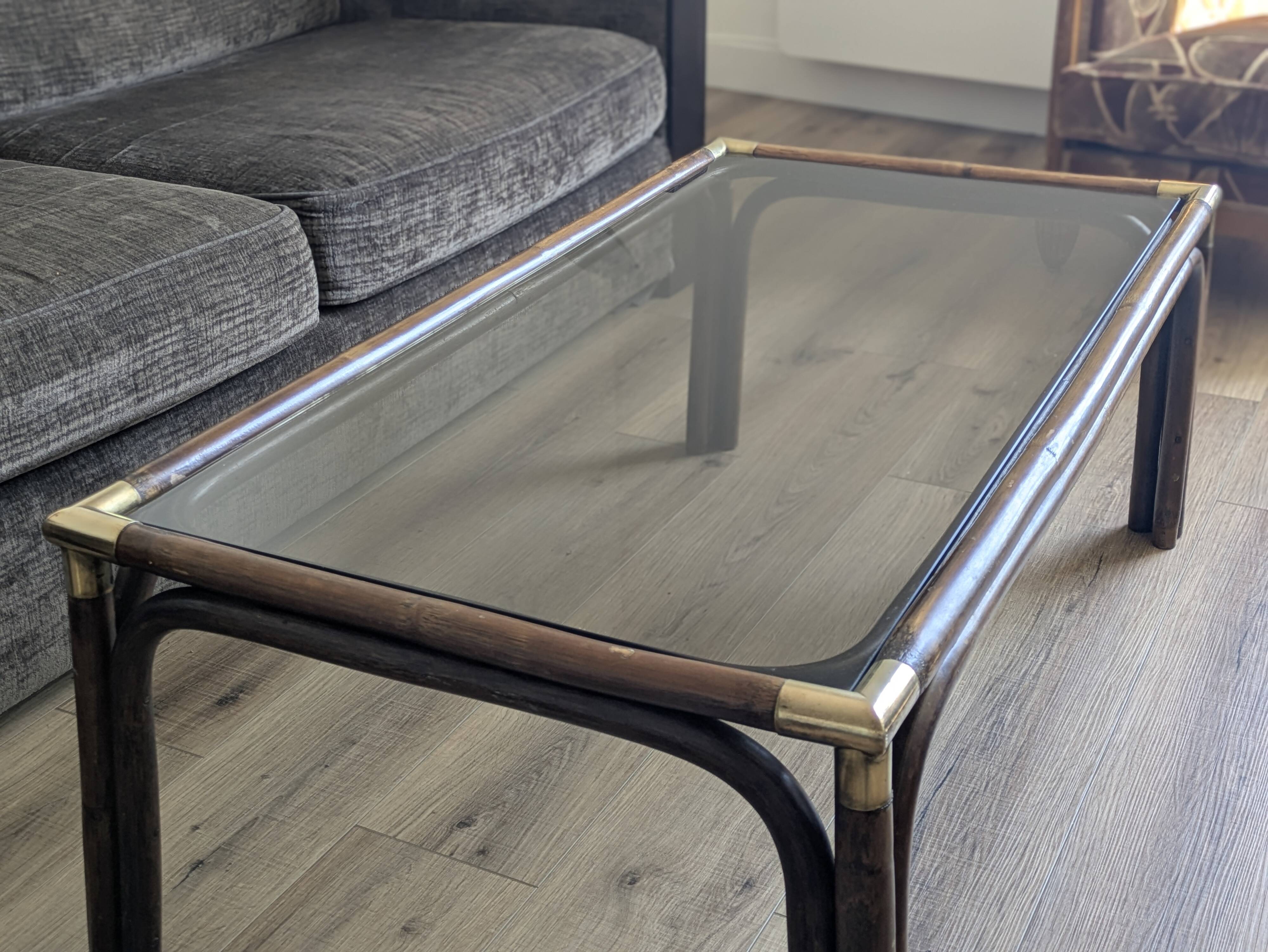Bamboo coffee table with brass corners and smoked glass