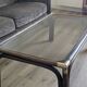 Bamboo coffee table with brass corners and smoked glass