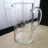 Jug, water decanter or fruit juice in grinded glass