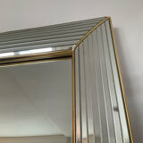 Large vintage Hollywood Regency style mirror with shutters.