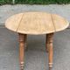 Renovated 18th century solid wood extendable round dining table with shutters
