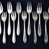 10 Fourchettes à poisson en métal argenté
