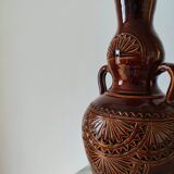 Ceramic vases with rosettes