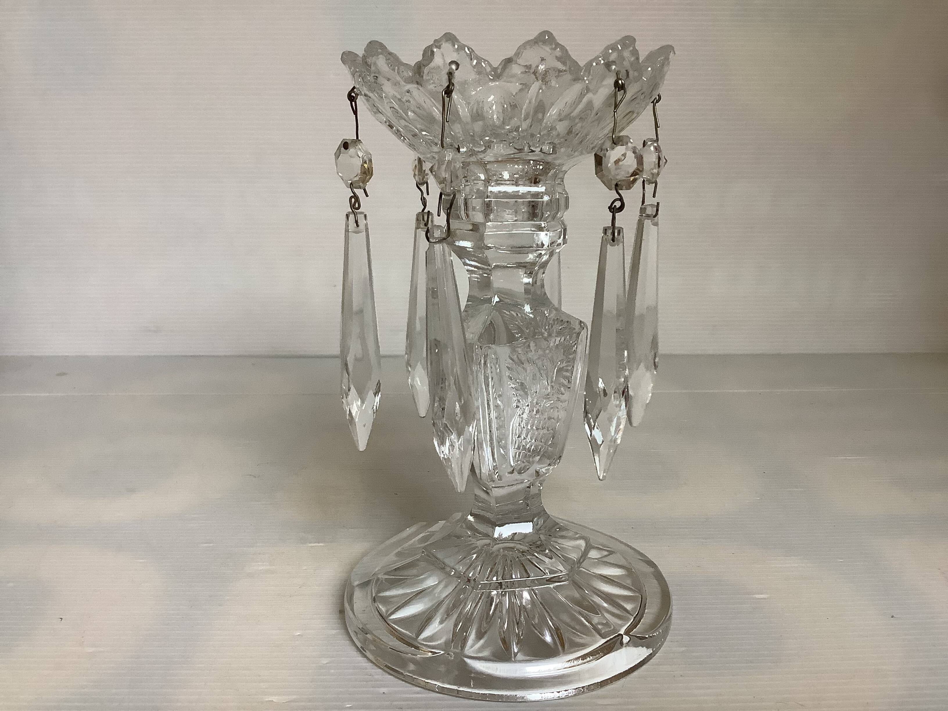 Pineapple candlestick with six glass moulded pendants.