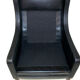 Fauteuil en cuir et palissandre Danemark 1960