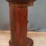 Circular mahogany selette