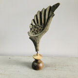 Old wooden wing on pedestal