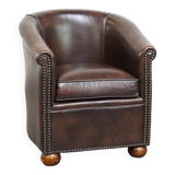 luxury dark leather club chair with English-style ball feet