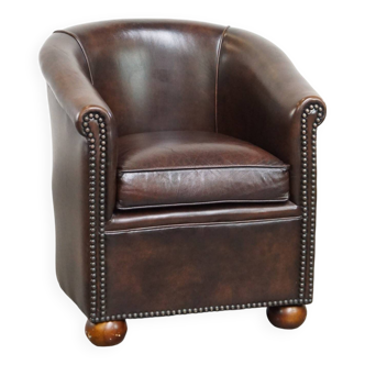 luxury dark leather club chair with English-style ball feet