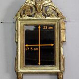 Miroir en bois doré, style Louis XVl, début XXe