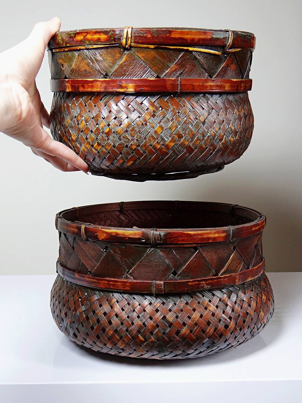 Pair of vintage nesting handmade Japanese woven bamboo baskets