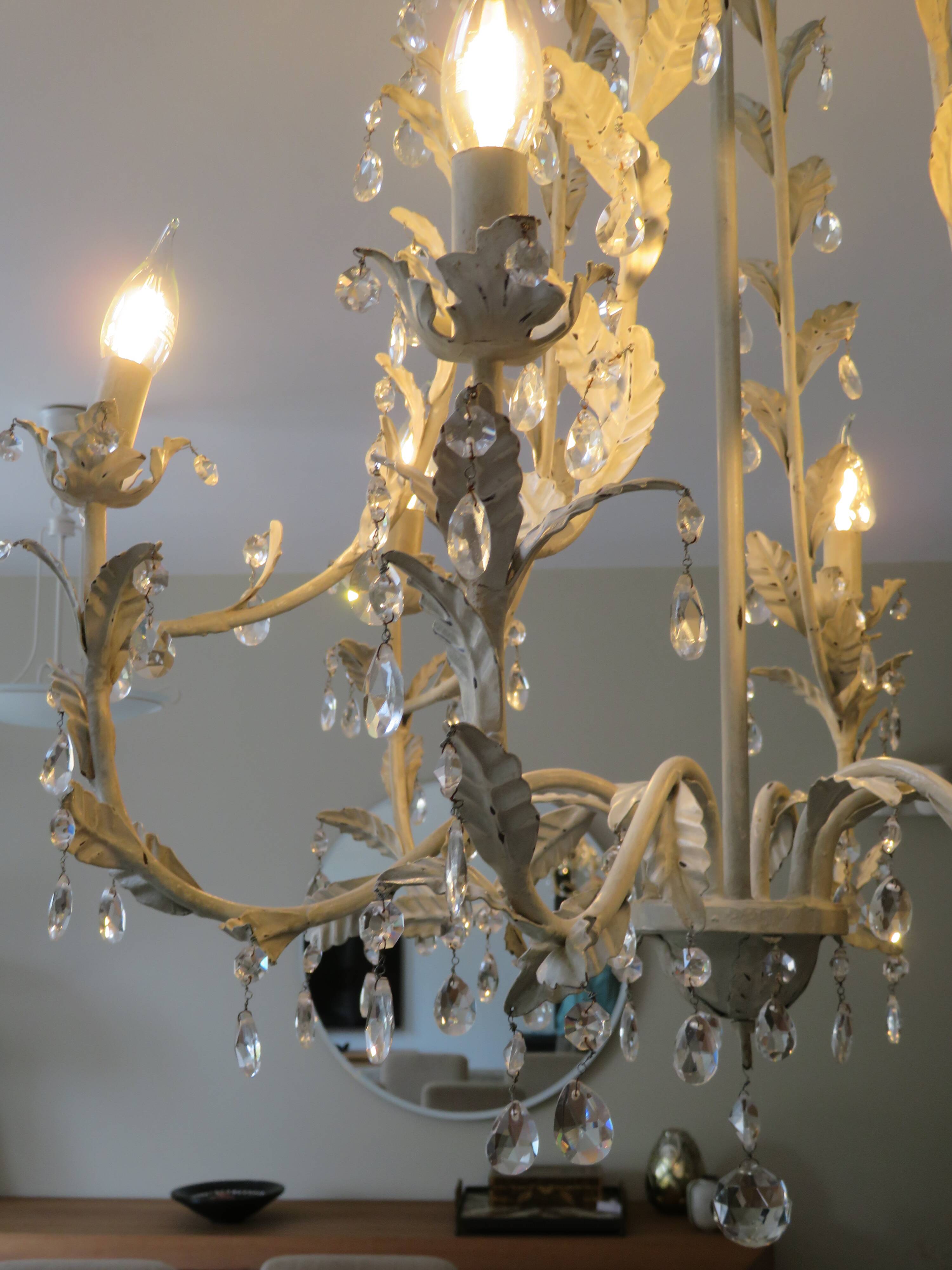 Large cage chandelier in aged metal.