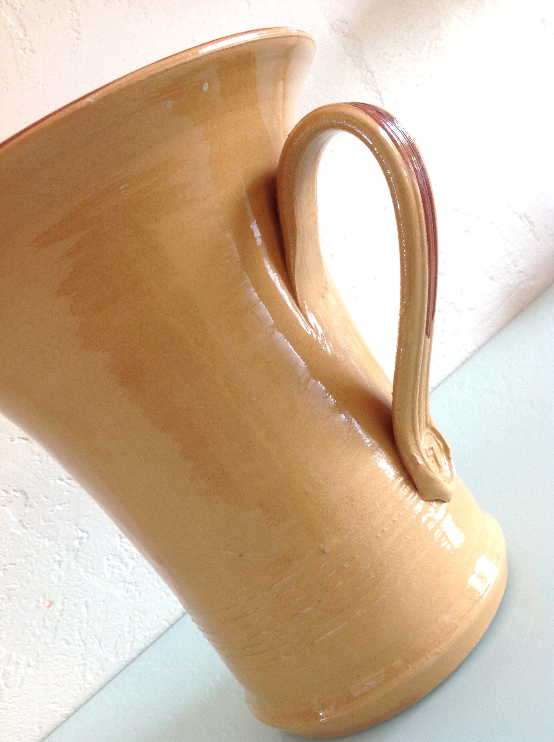 Pitcher in glazed ochre ceramic 50/60 years