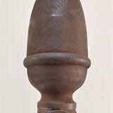 Pair of sculptural cast iron chenets with twisted heads