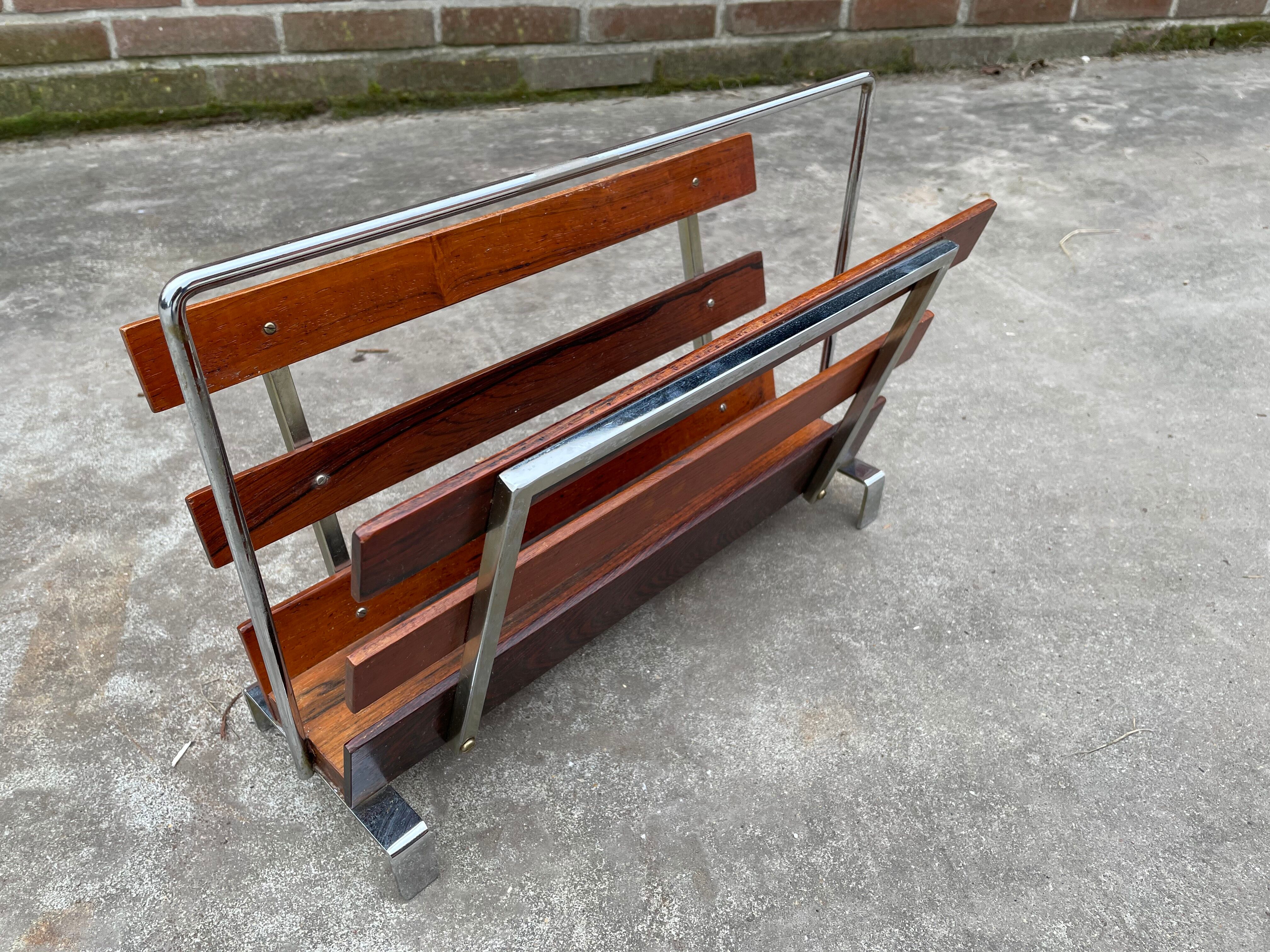 Vintage magazine rack from  rosewood and chrome design