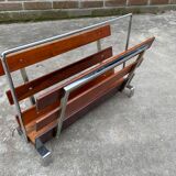 Vintage magazine rack from  rosewood and chrome design