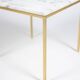 Pair of marble and gilt bronze end tables. 1970s.