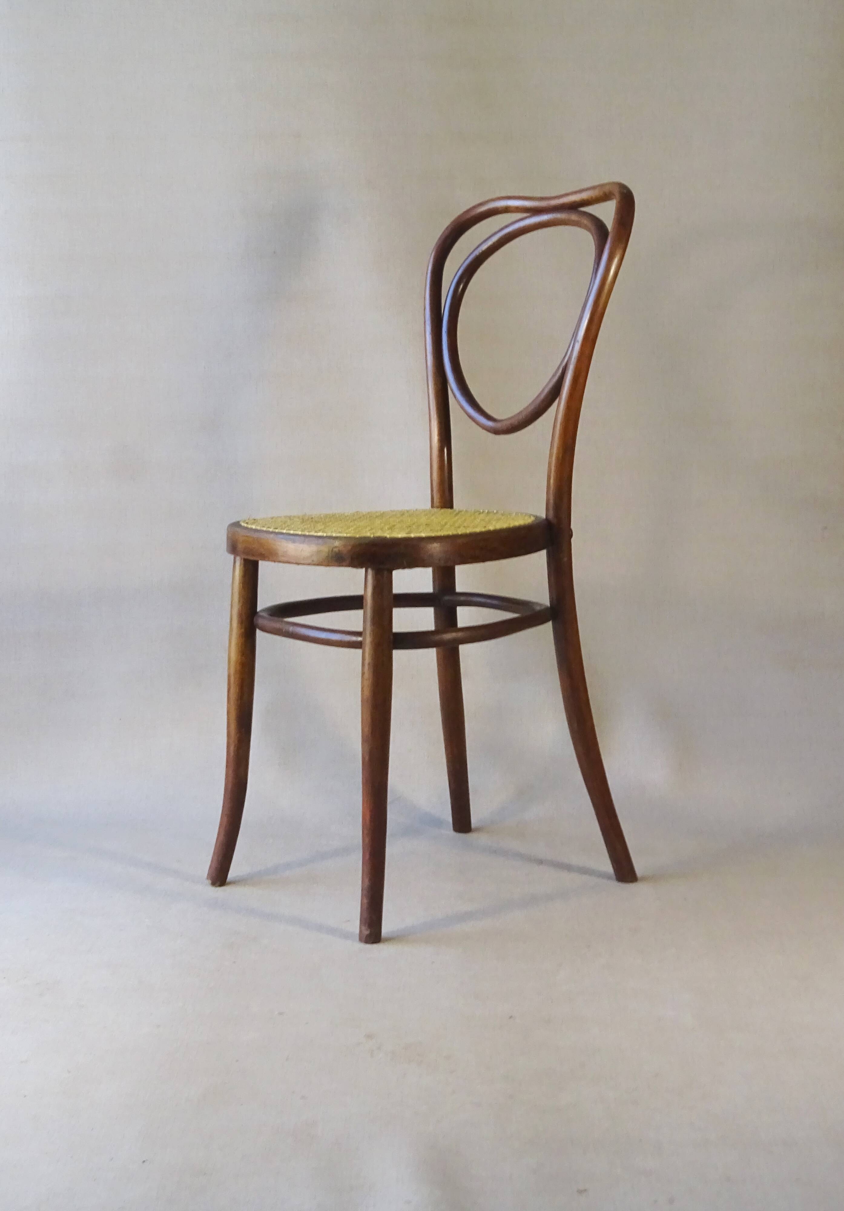 Fake pair of caned bistro chairs, Kohn and Mundus, circa 1910 - no Thonet.