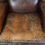 Sheep leather wing chair with patina