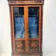 Napoleon III display cabinet in rosewood veneer and marquetry, 19th century.