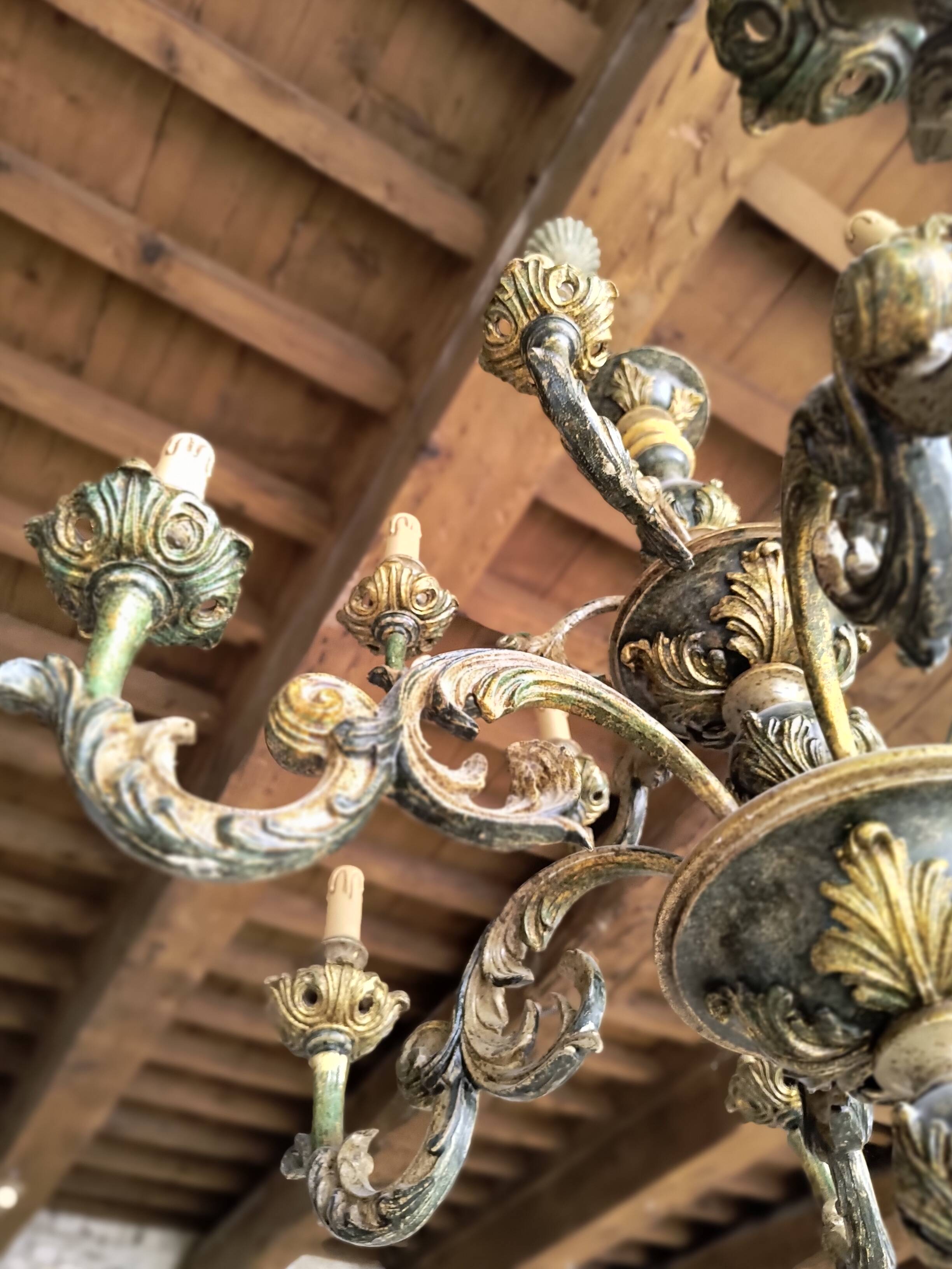 Florentine chandelier with 12 lights, double tier, gold leaf.