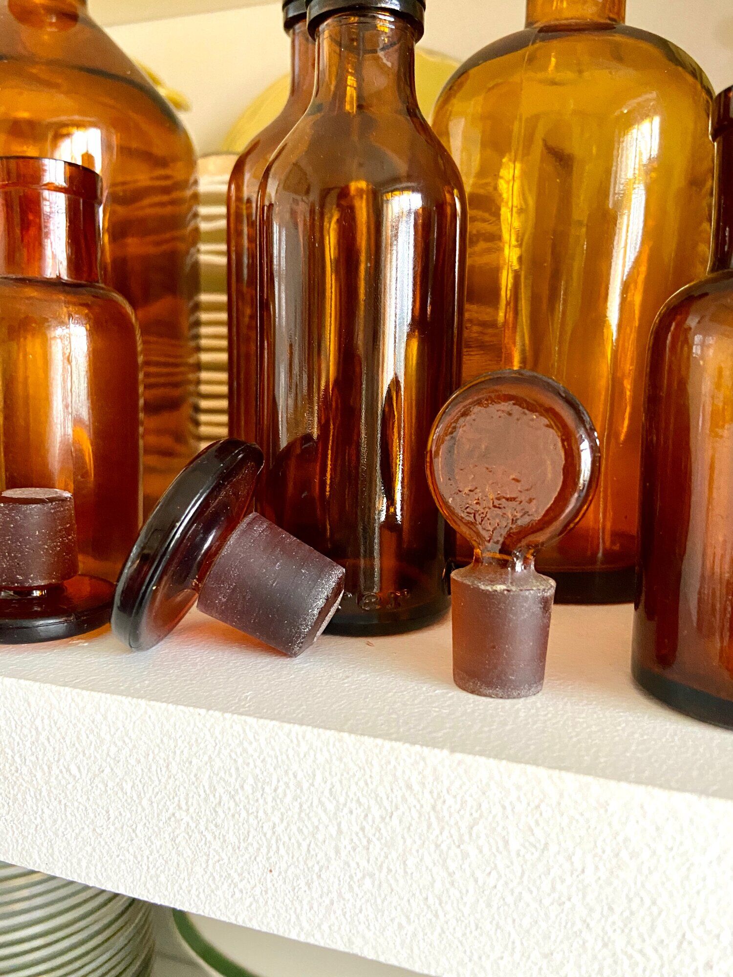 8 amber glass apothecary bottles