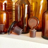 8 amber glass apothecary bottles