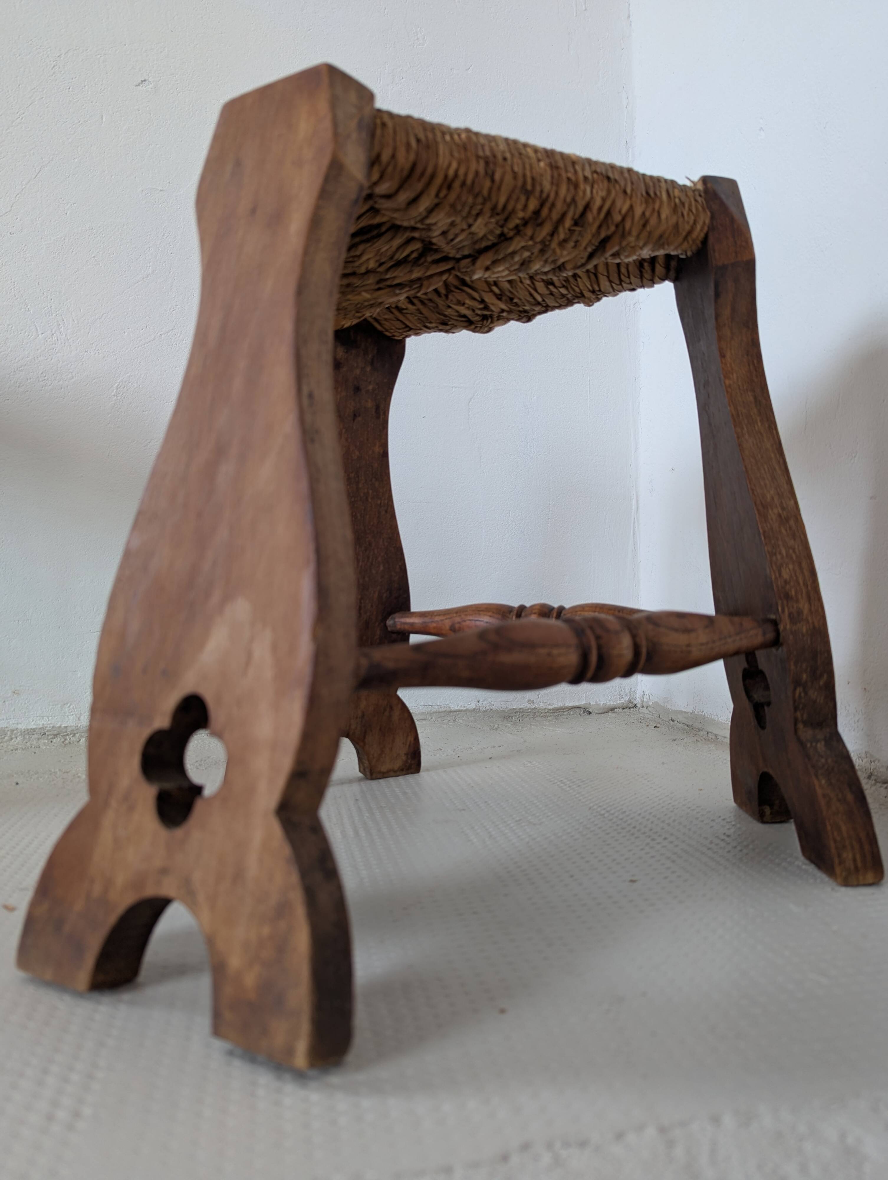 Low tripod farm stool in wood and straw