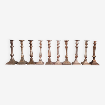 Set of 10 bronze-tinted brass candle holders 01 Pro