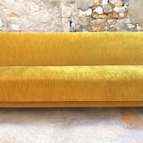Convertible sofa in golden yellow velvet