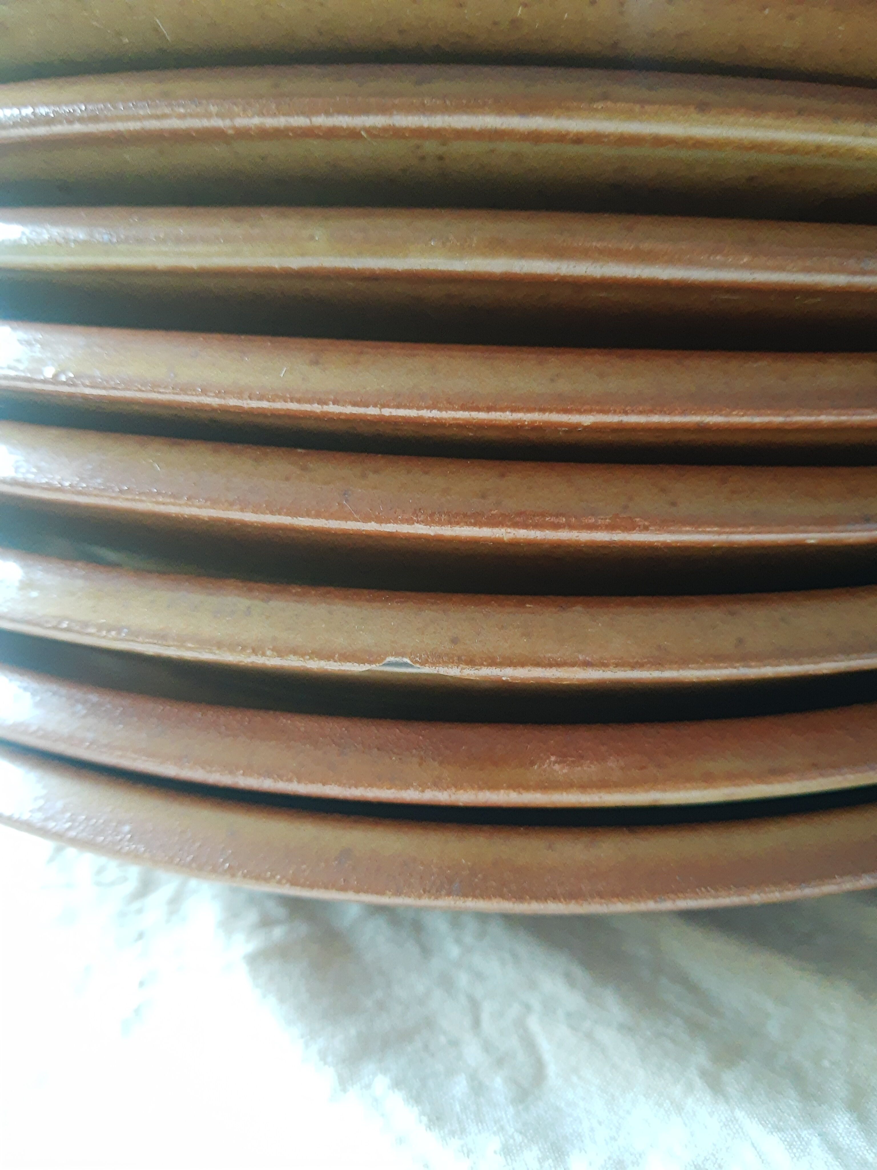 Set of 8 vintage brenne stoneware flat plates