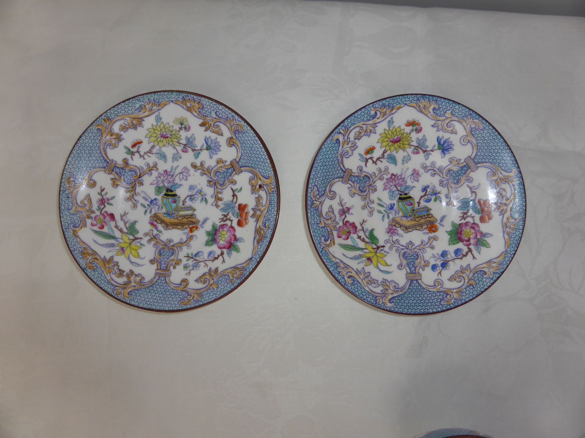 Pair of Rörstrand porcelain coffee cups with Japanese floral decoration