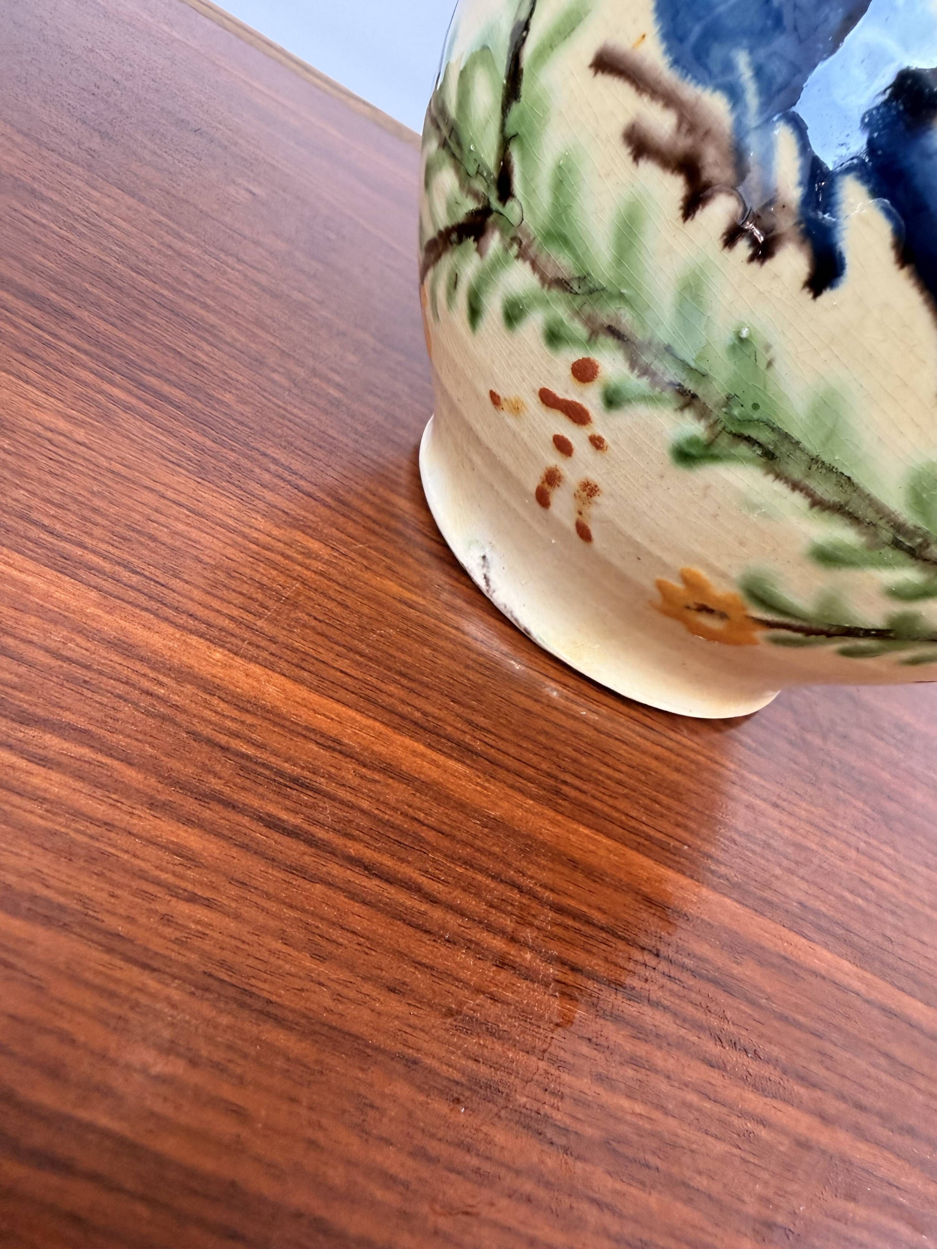 Large vase in glazed pottery decorated with blue birds and flowers.