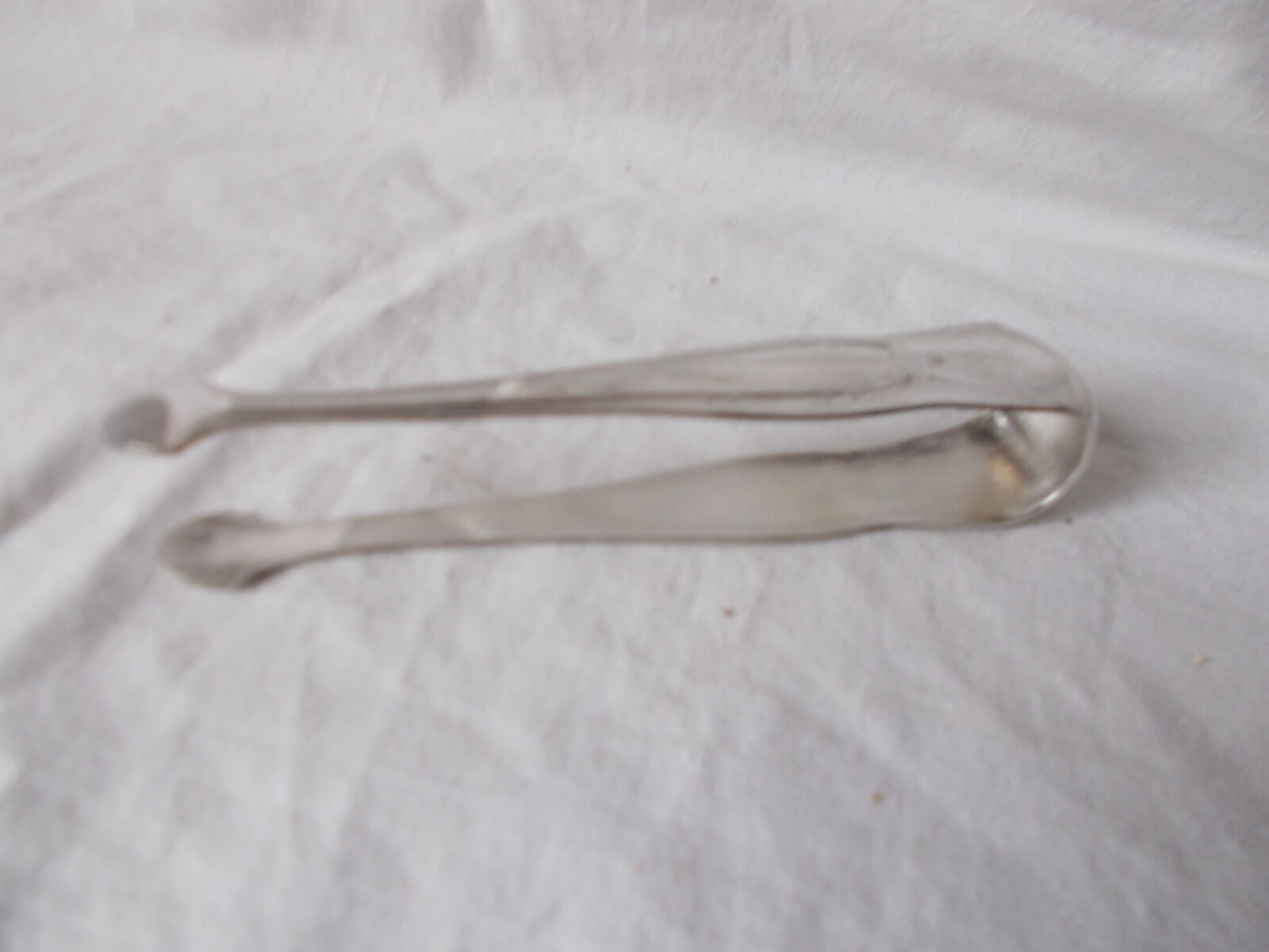 Silver metal sugar pinch