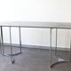 Smoked glass console with chrome legs, 1970.