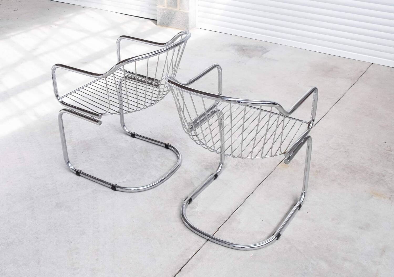 Pair of vintage Rinaldi style chrome chairs