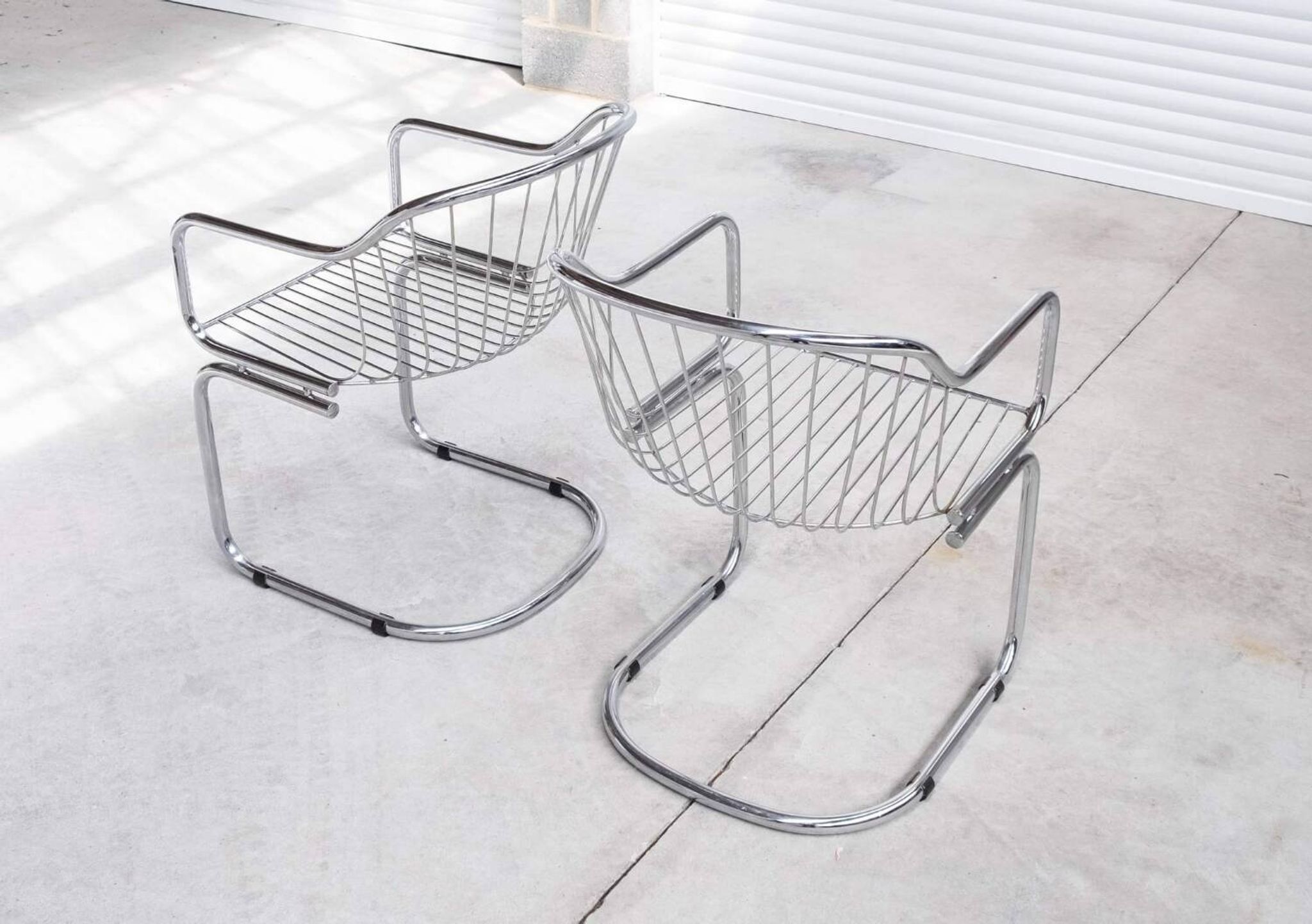 Pair of vintage chrome chairs in Rinaldi style