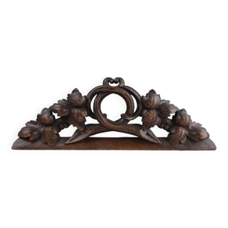 Oak pediment with hand-carved oak leaves around a wreath, France ca. 1850
