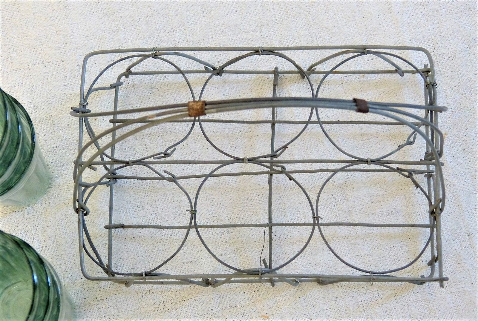 Together with 6 glasses wire basket