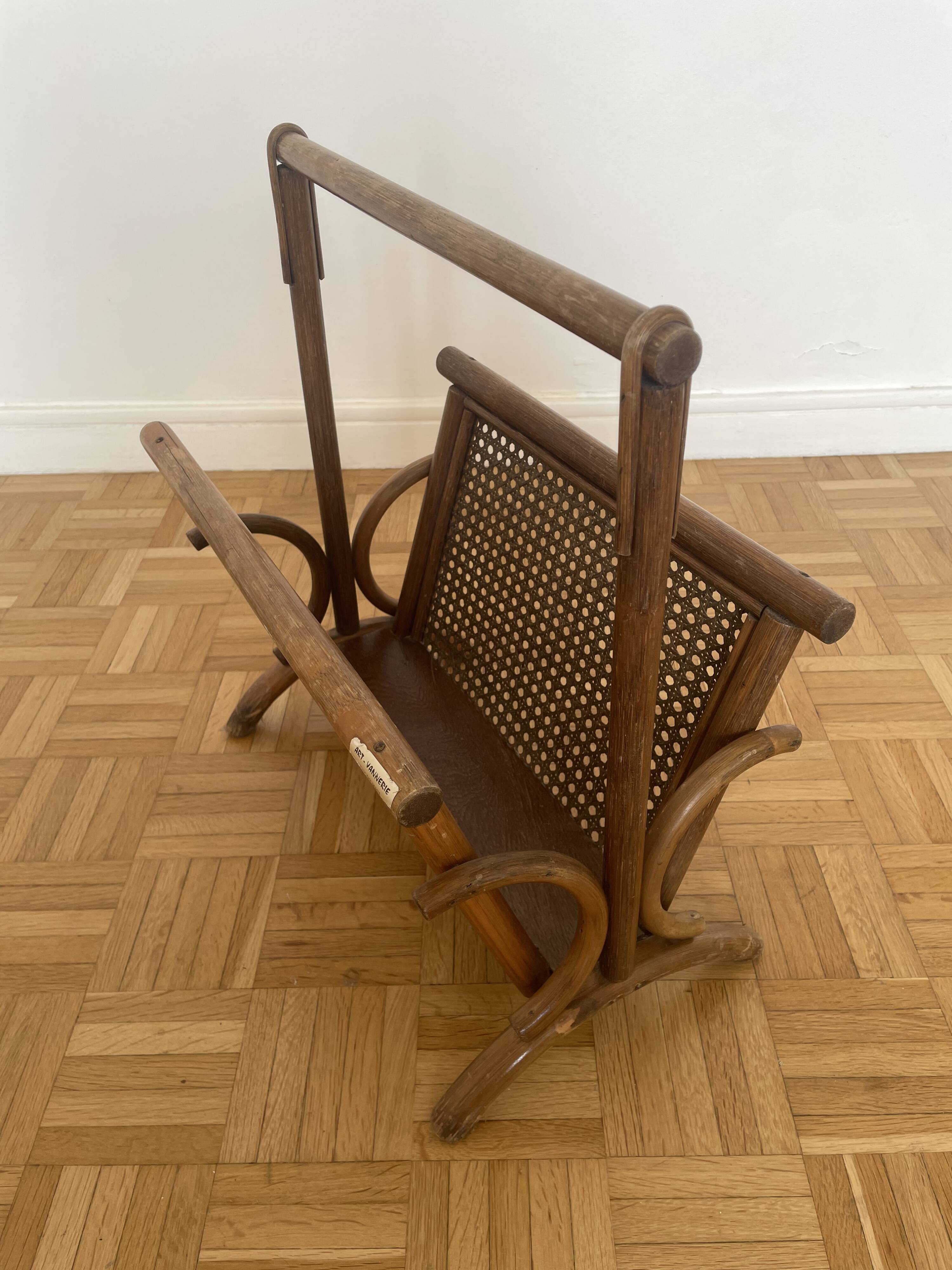 Brown rattan and cane magazine rack