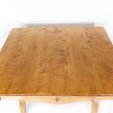 Dining table with extensions of birchwood