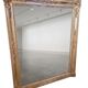 Antique gilded mirror from the 19th century, mercury mirror.