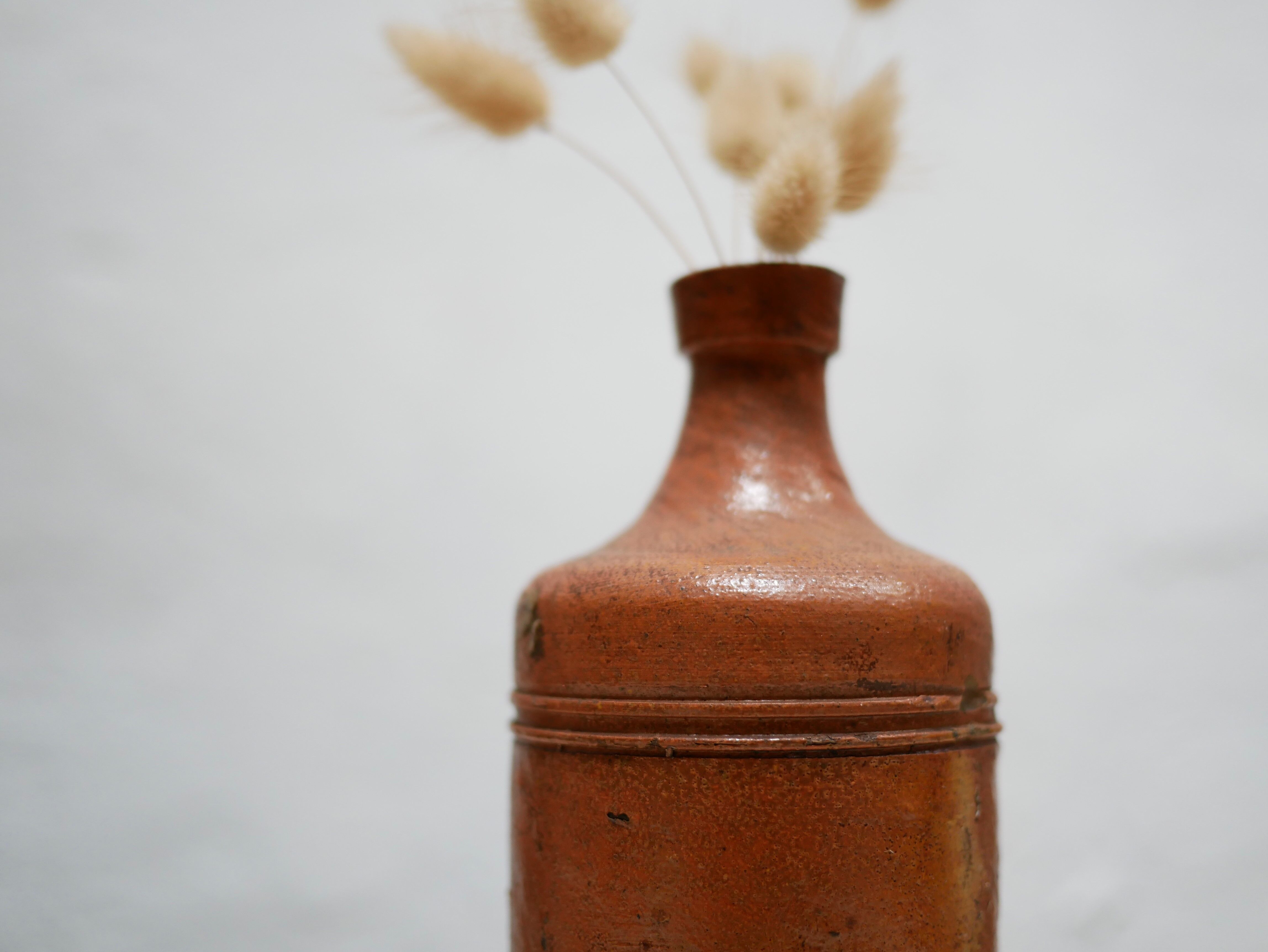 Bottle vintage glazed terracotta vase