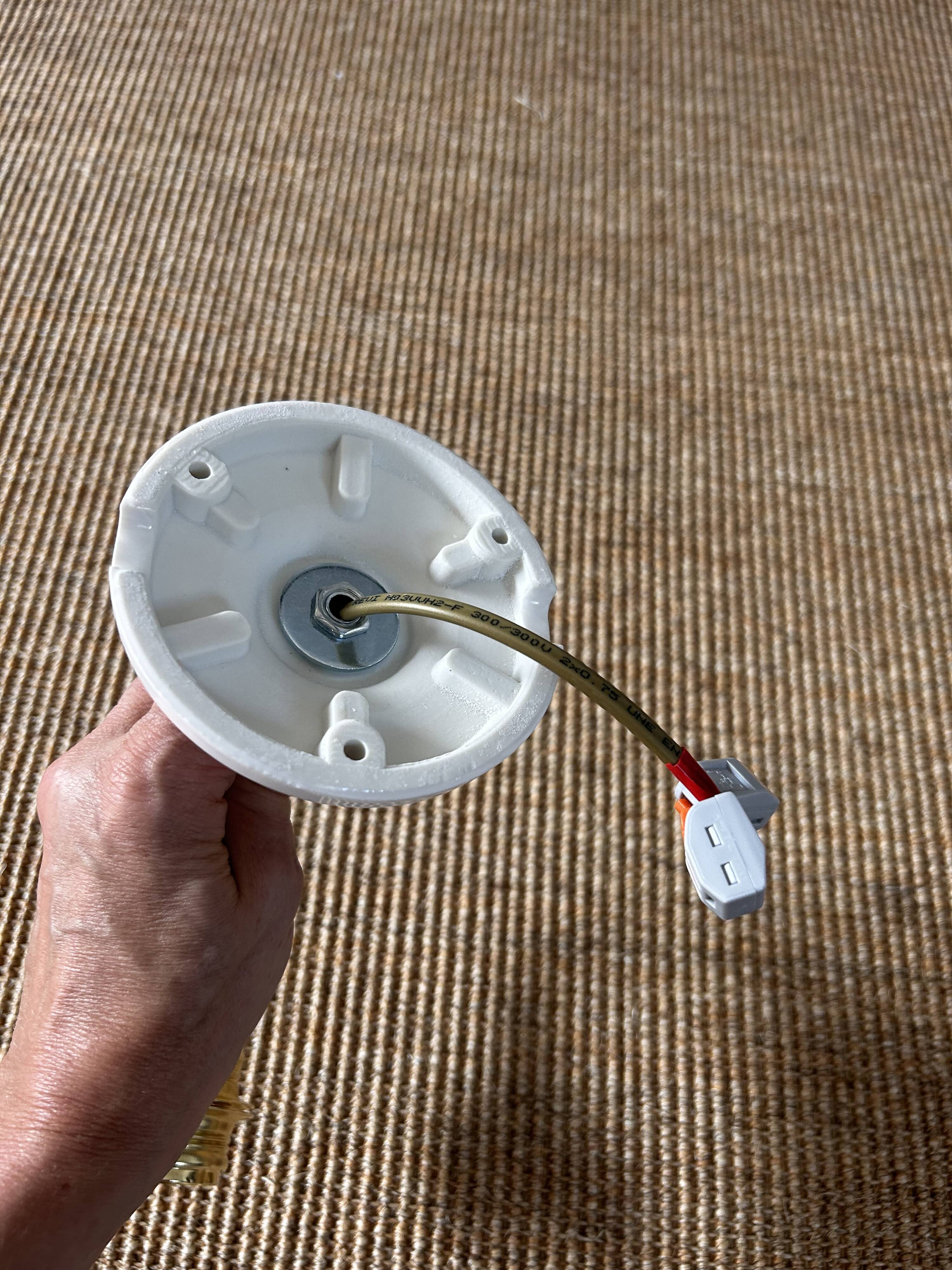 Two wall sconces in serrated white opaline