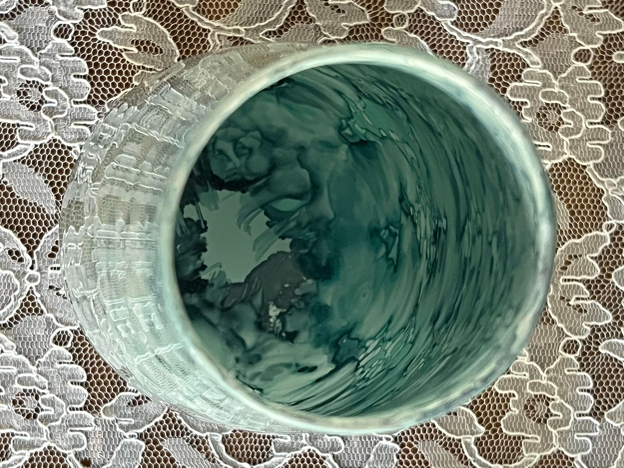 Blue speckled and marbled glass vase