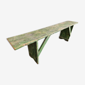 Old wooden bench side table grass green
