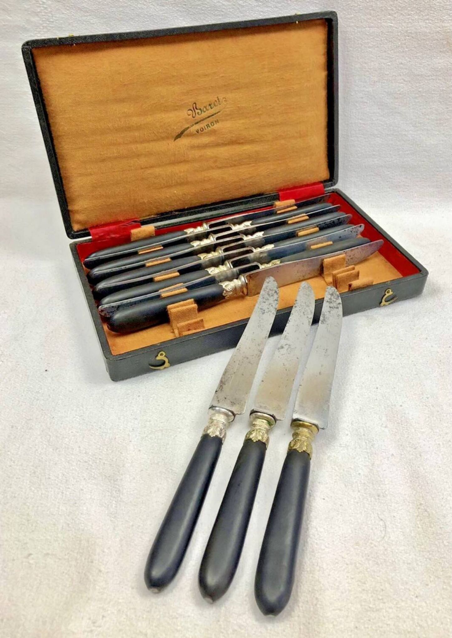 12 antique large table knives with ebony handles from the Napoleonic III period.